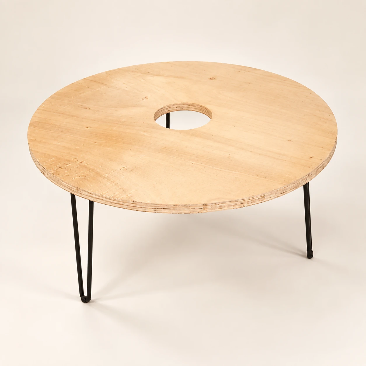 Round plywood table with center hole