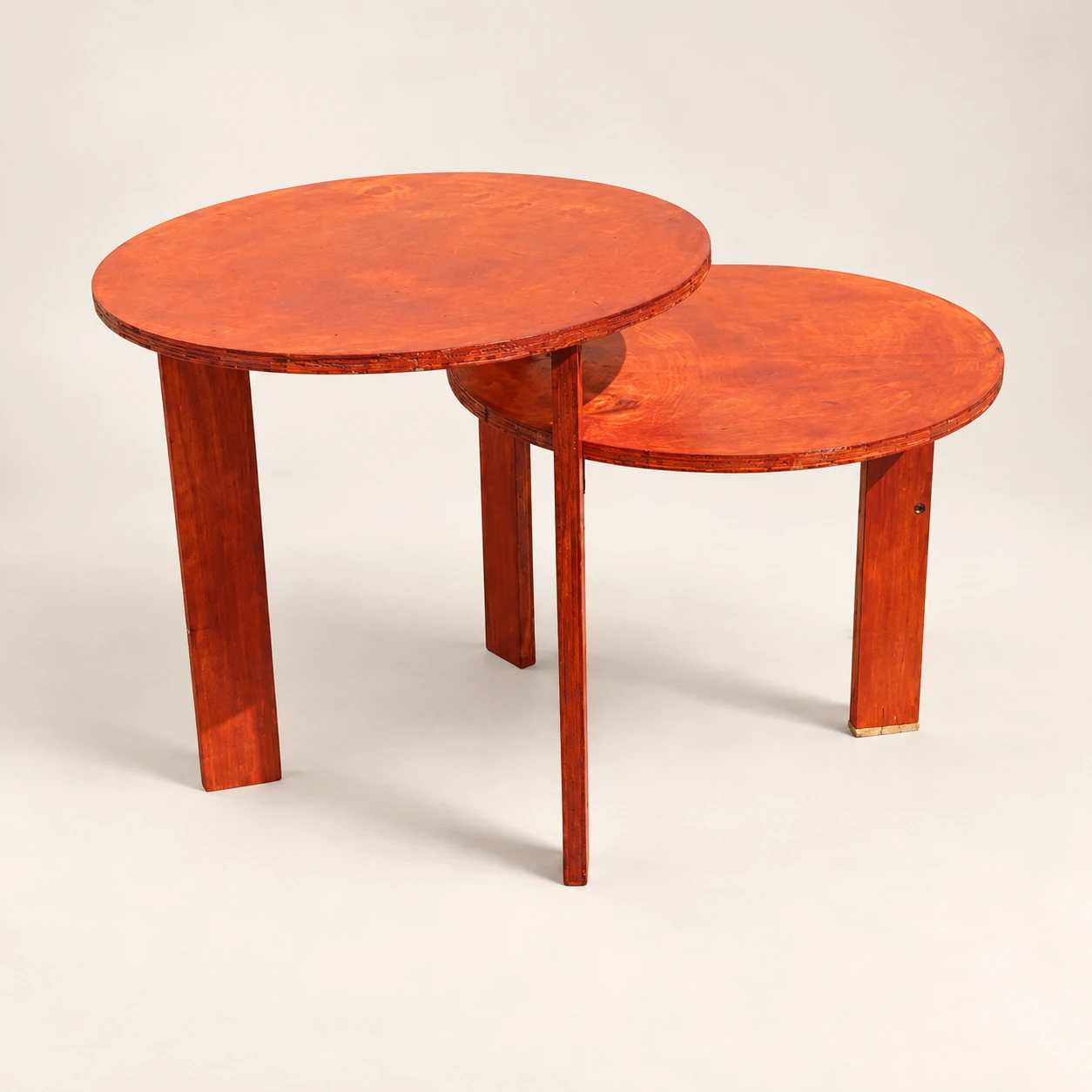 Mbejembeje — Reddish-orange circular nesting side tables