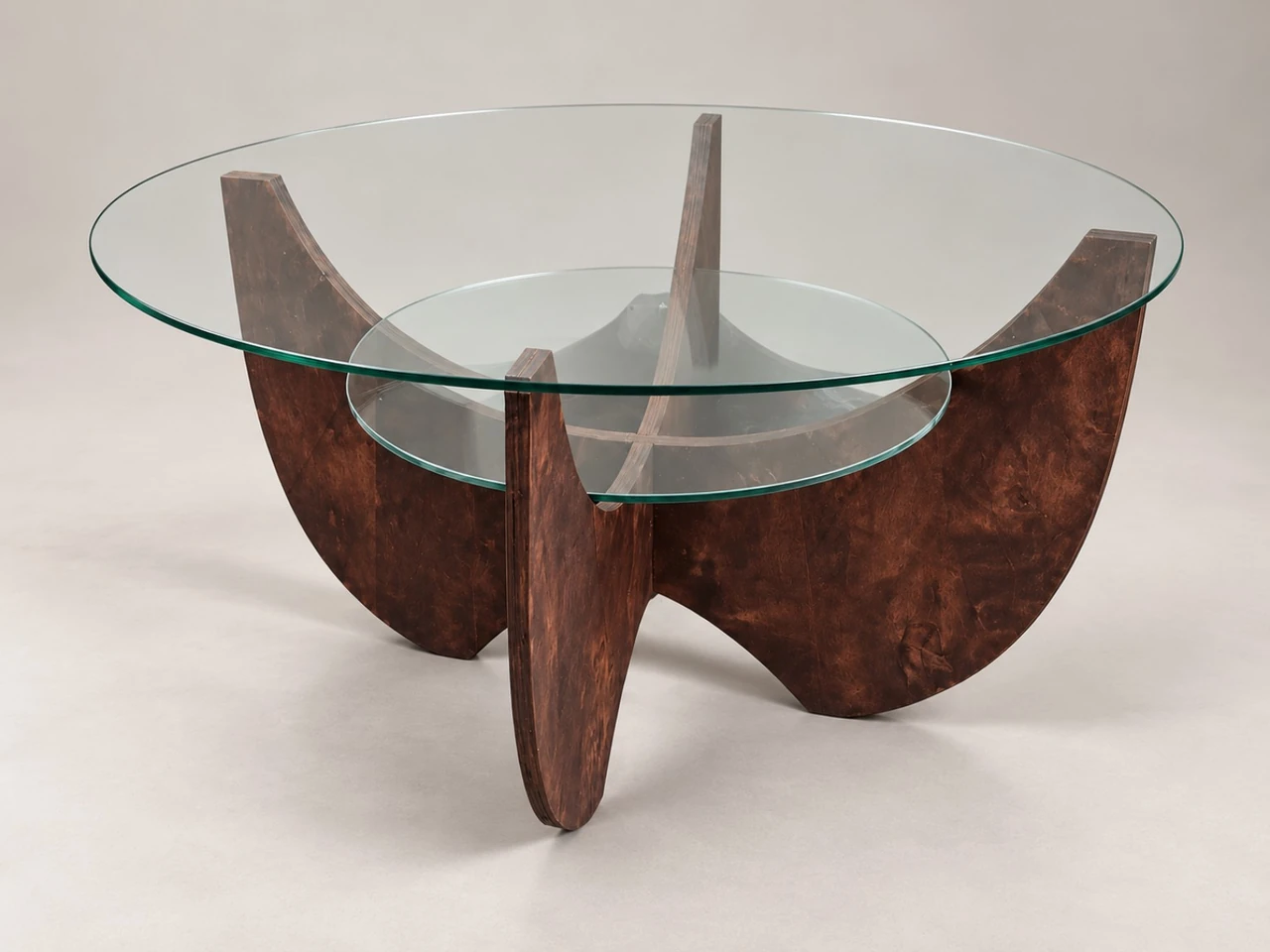 Dayisa izwe dark curved cross-panel wooden table with a circular clear-glass top and smaller internal glass shelf